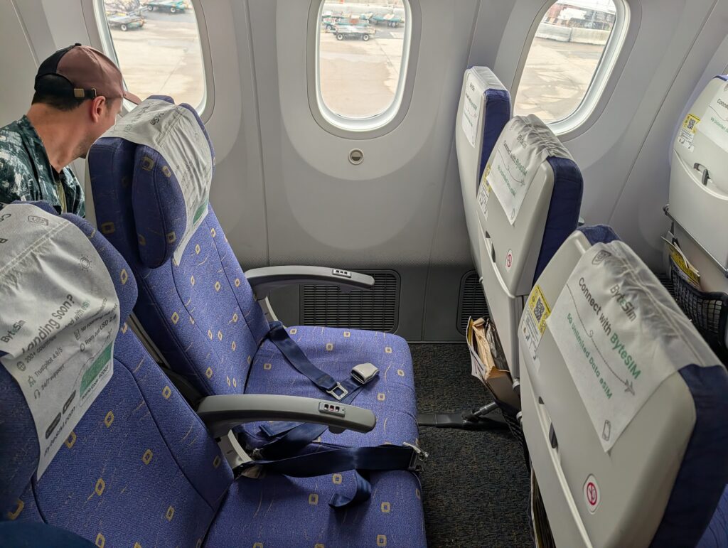Row 40 on the B787-8 — the 3-to-2 configuration means the seat beside you simply disappears. That gap did a lot of work over 7 hours.