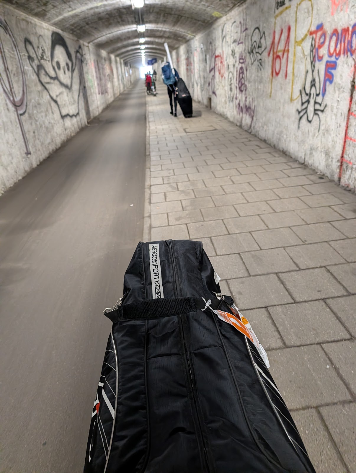 Aerocomfort bike bag being pulled through graffiti tunnel, Munich, April 2026