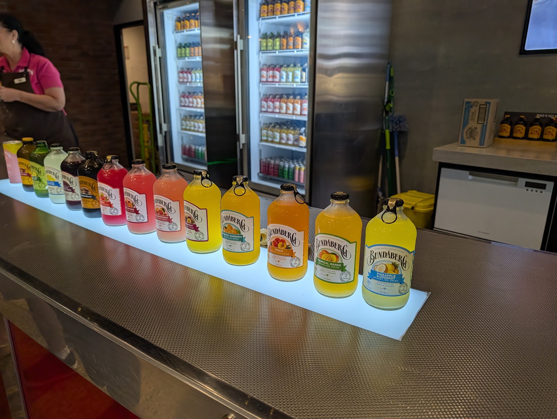 A lineup of Bundaberg sparkling drink flavours on the tasting bar at the Bundaberg Brewed Drinks visitor centre