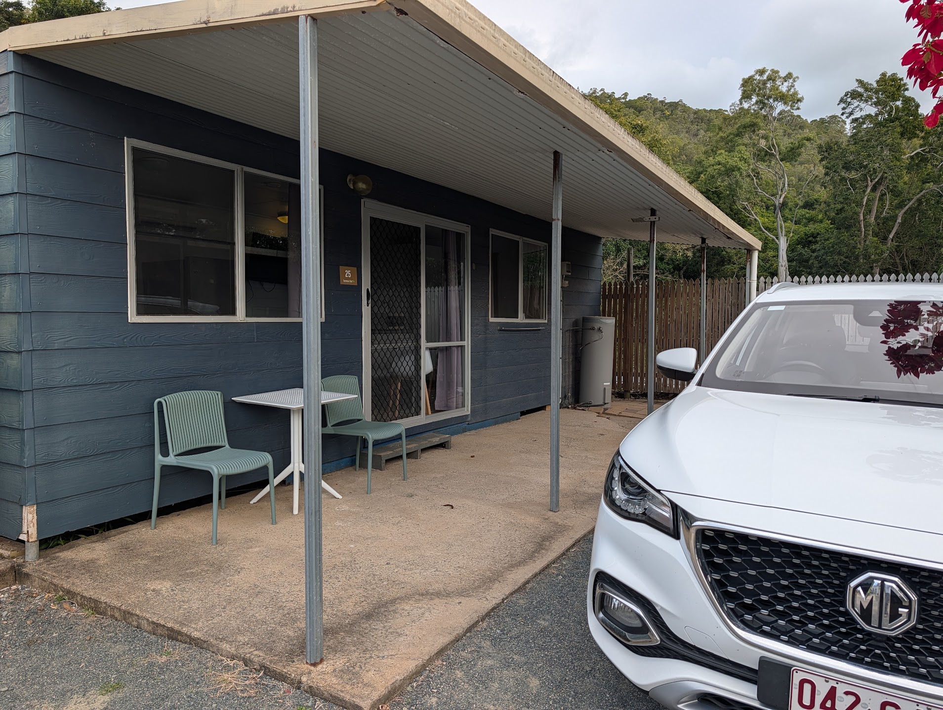 MG relocation car parked outside a cabin at Cape Hillsborough Nature Tourist Park
