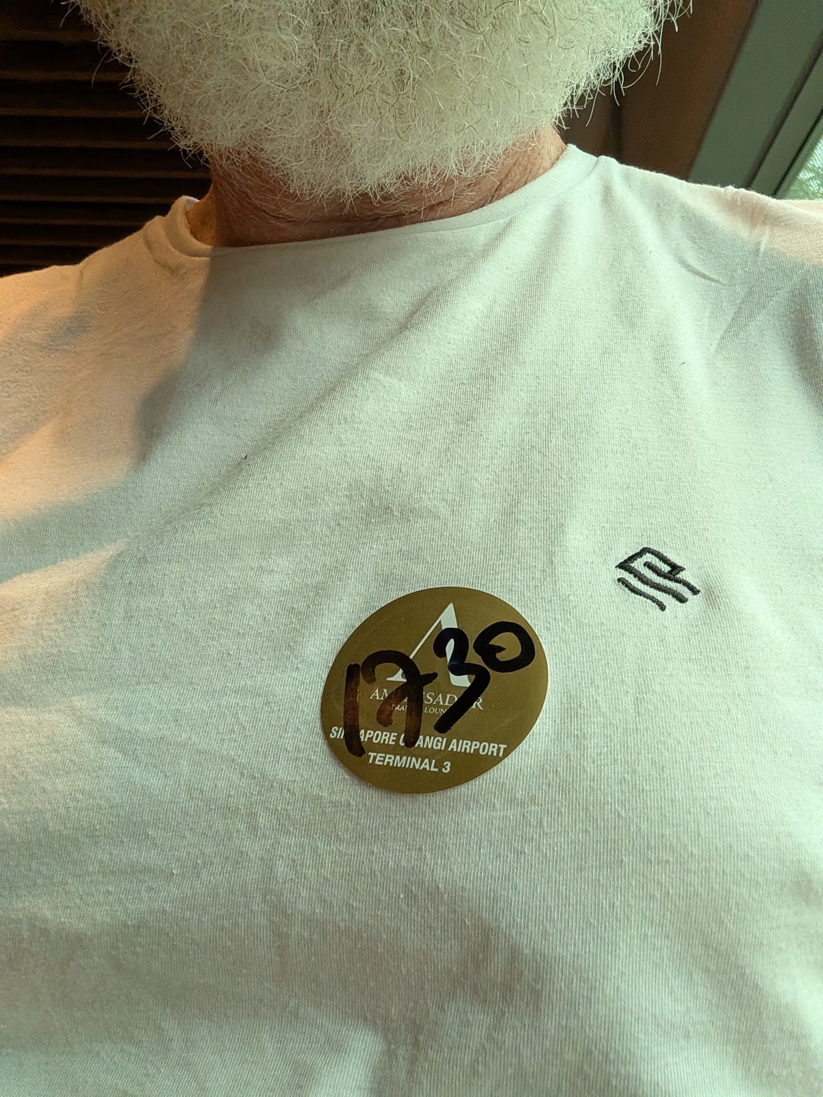 Ambassador Transit Lounge sticker showing a 17:30 exit time