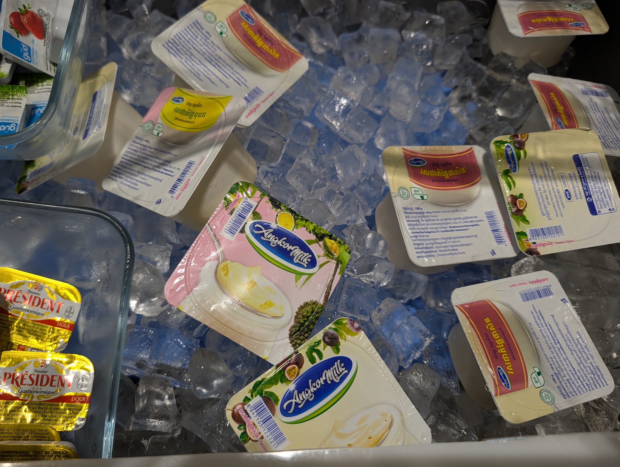 Durian and passionfruit yoghurt tubs on ice at the Angkor Lounge buffet