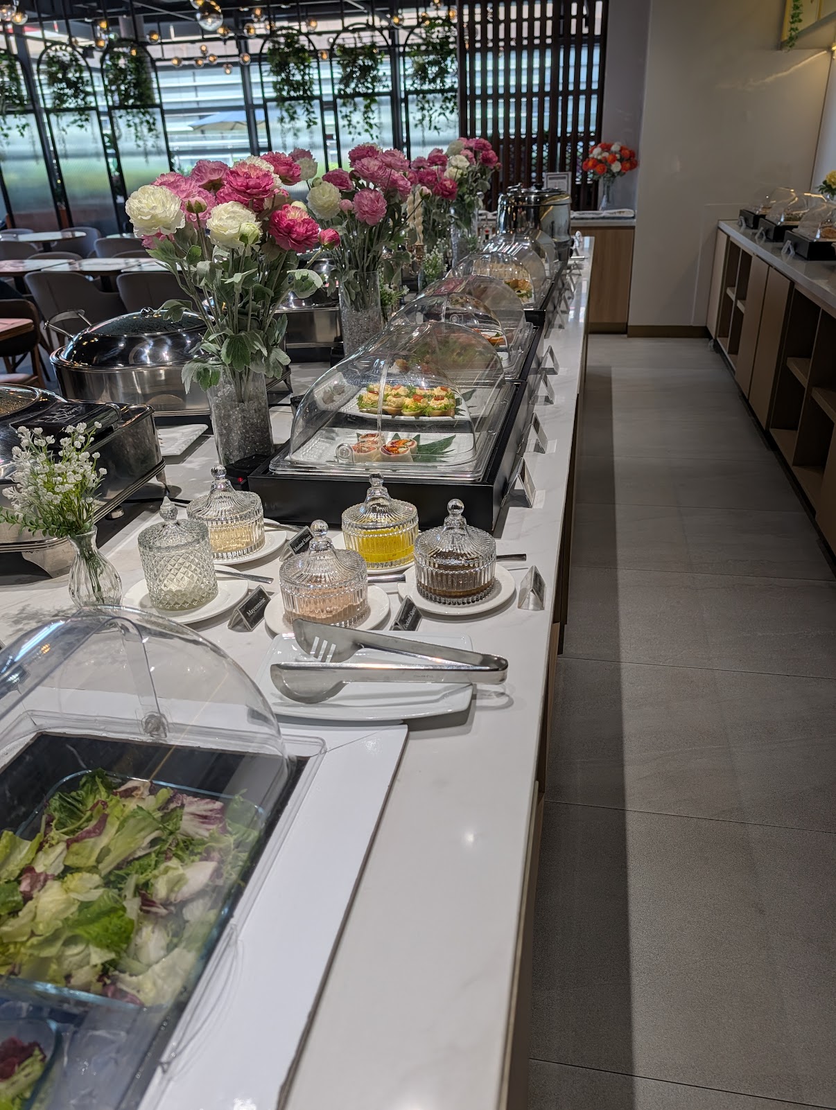 Buffet line with salads, canapés and hot dishes at the Angkor Lounge, Siem Reap