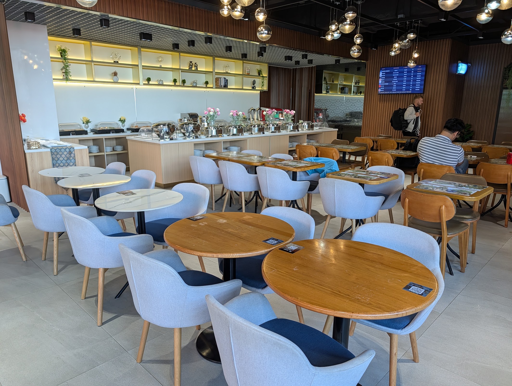 Main dining and seating area of the Angkor Lounge at Siem Reap airport